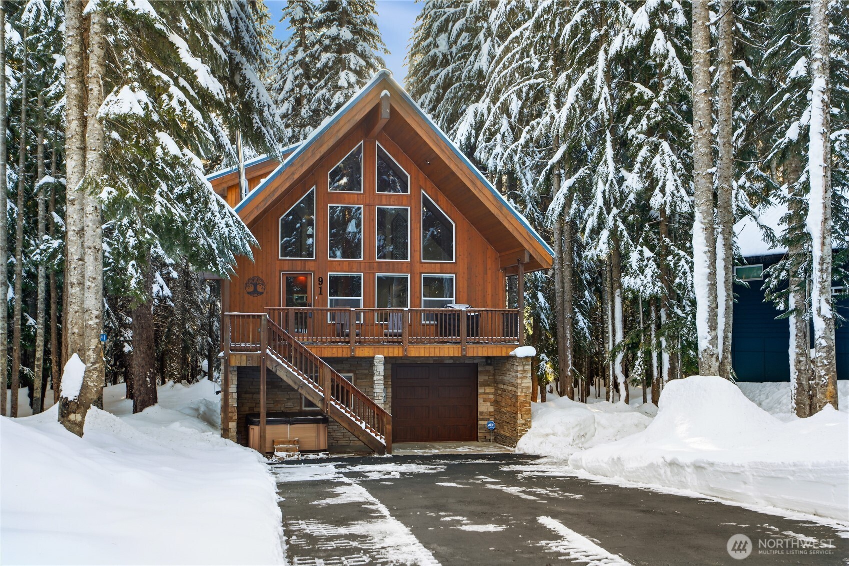 91 Mountain Home Road Snoqualmie Pass, WA 98068 - Photo 2 of 34 a front view of a house with a yard