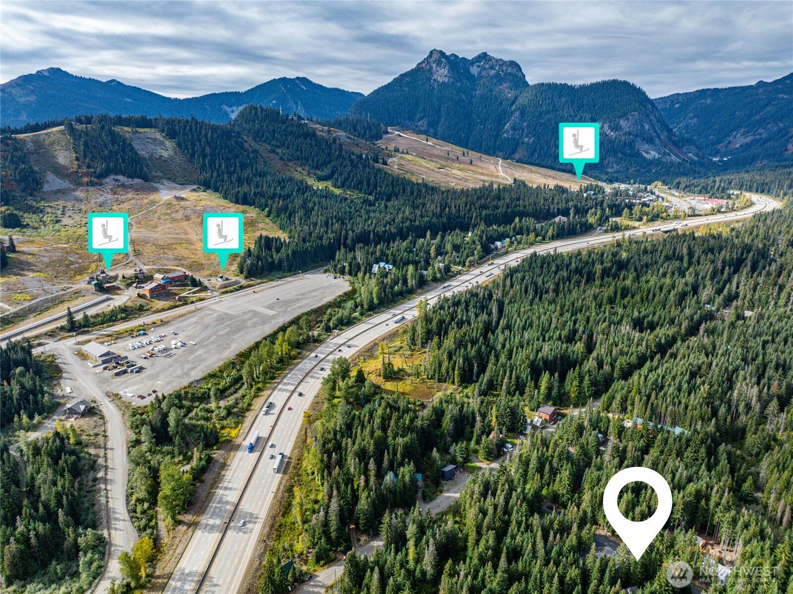 91 Mountain Home Road Snoqualmie Pass, WA 98068 - Photo 29 of 34 a view of a house with a yard and potted plants