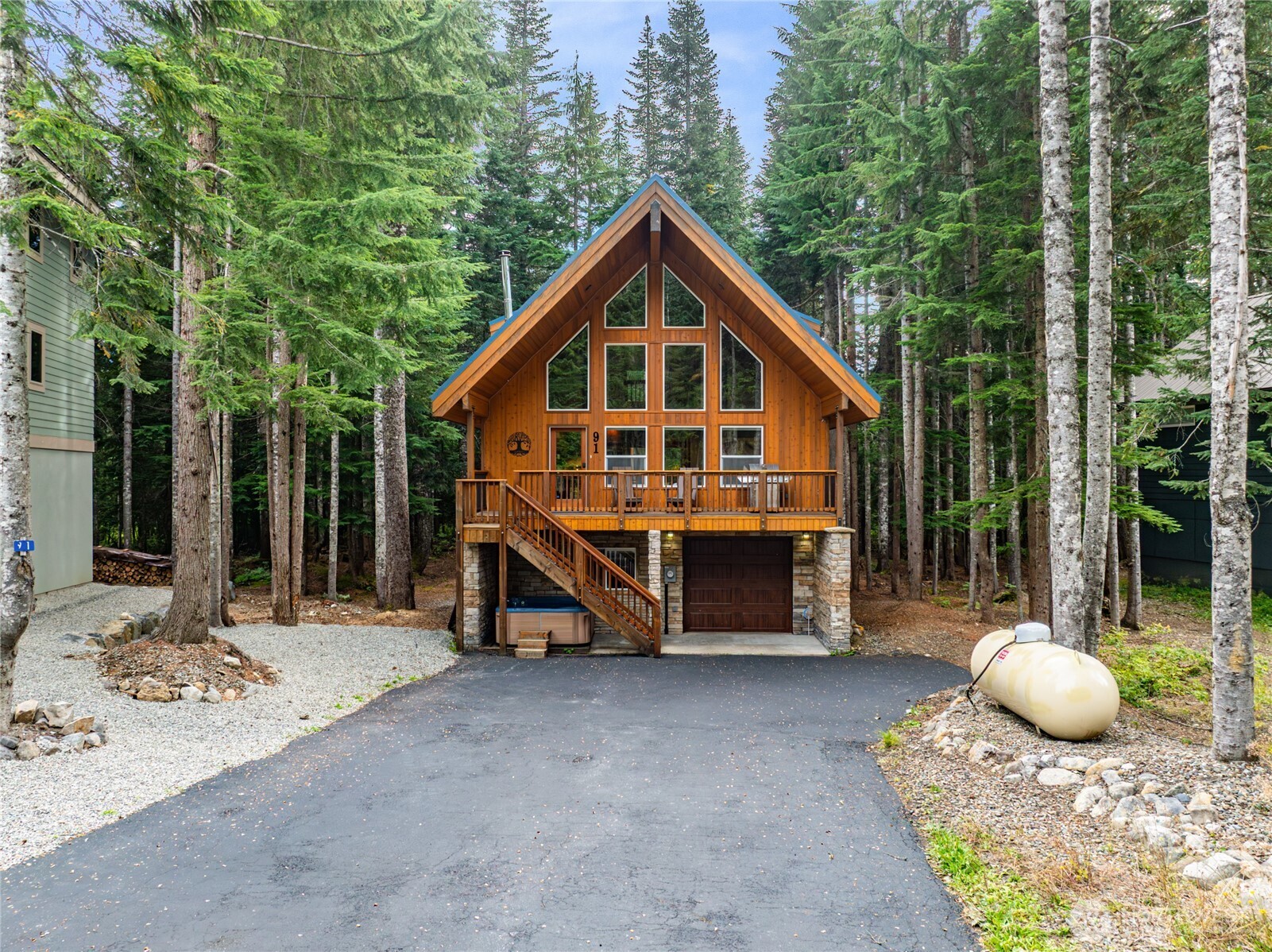 91 Mountain Home Road Snoqualmie Pass, WA 98068 - Photo 33 of 34 a view of a house with a yard balcony and sitting area