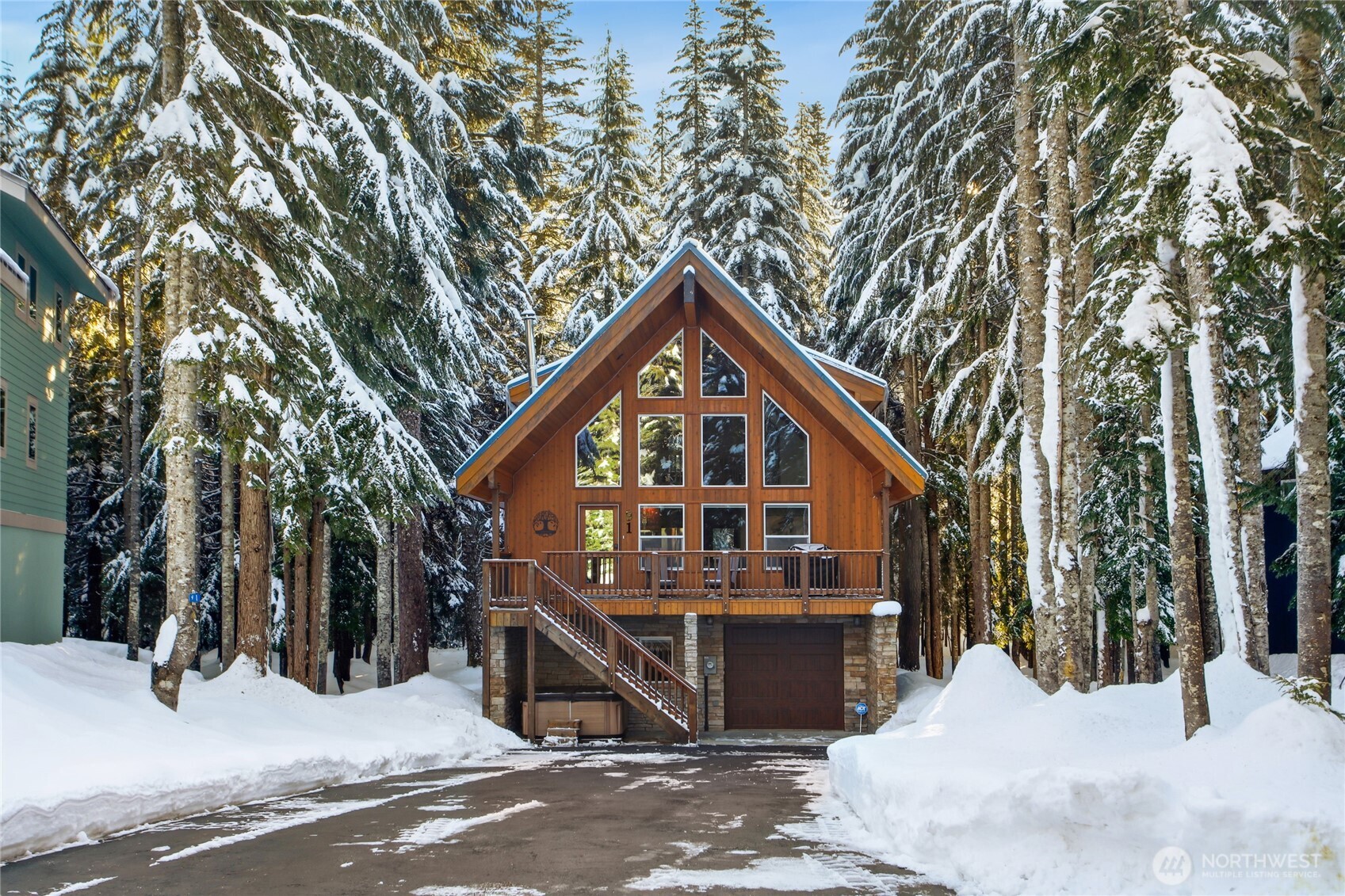 91 Mountain Home Road Snoqualmie Pass, WA 98068 - Photo 34 of 34 a view of a house with a snow in the background