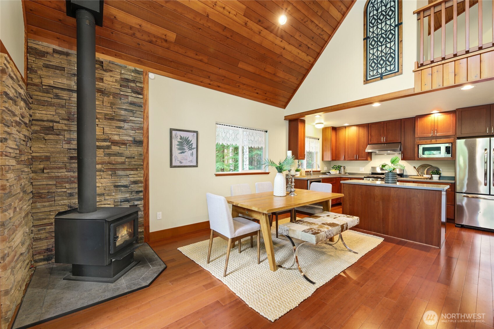 91 Mountain Home Road Snoqualmie Pass, WA 98068 - Photo 6 of 34 a living room with furniture and a fireplace