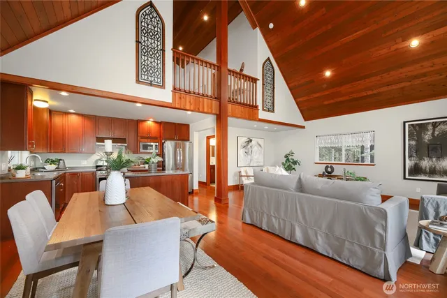 a kitchen with stainless steel appliances a refrigerator sink and cabinets