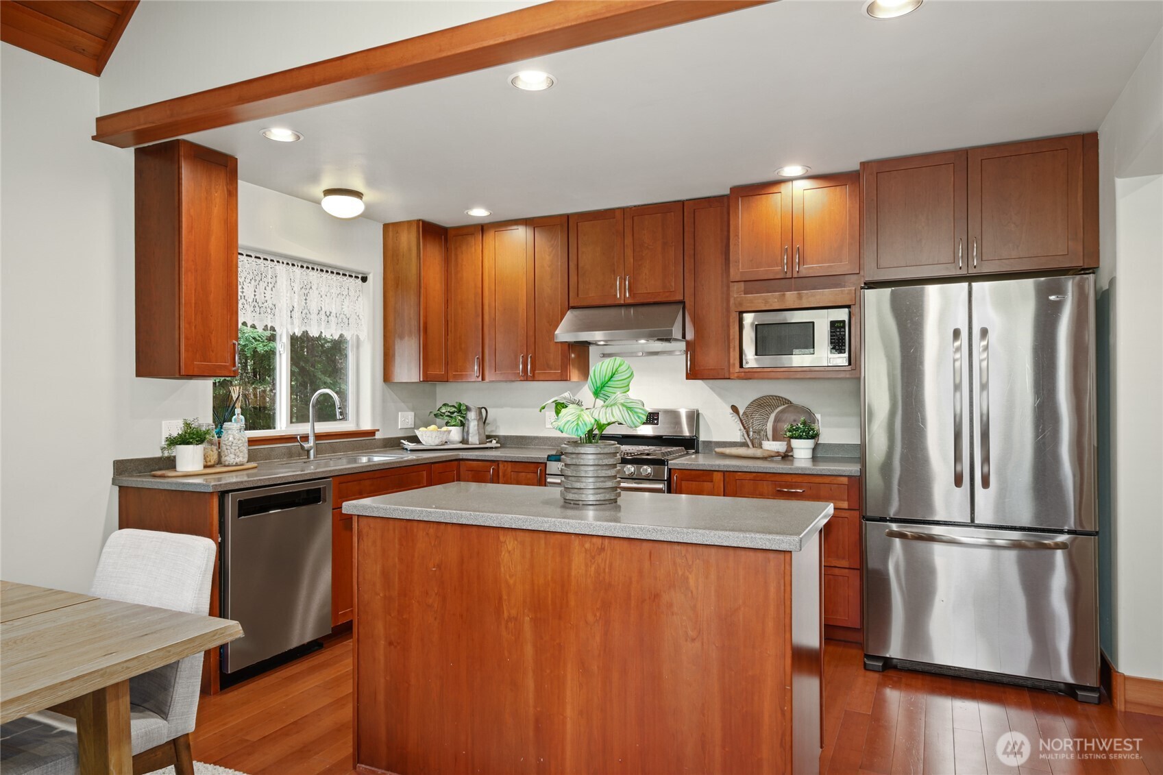 91 Mountain Home Road Snoqualmie Pass, WA 98068 - Photo 7 of 32 a kitchen with stainless steel appliances a refrigerator sink and cabinets
