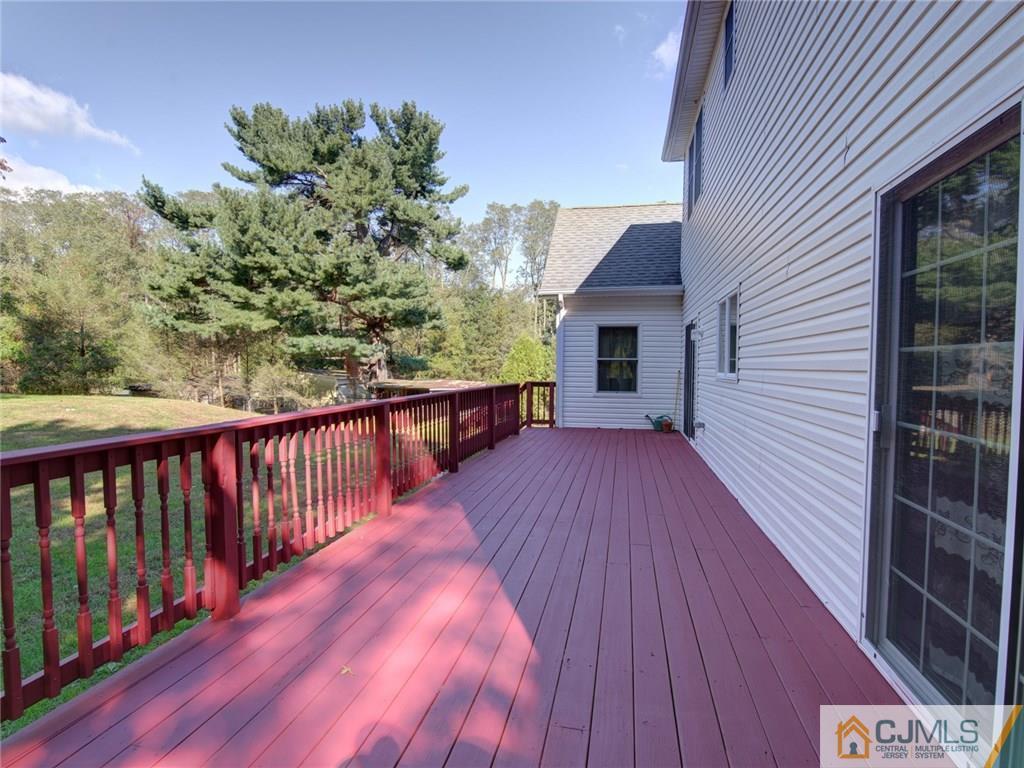 110 Cottrell Road Old Bridge, NJ 07747 - Photo 23 of 25 a view of balcony with wooden floor and fence