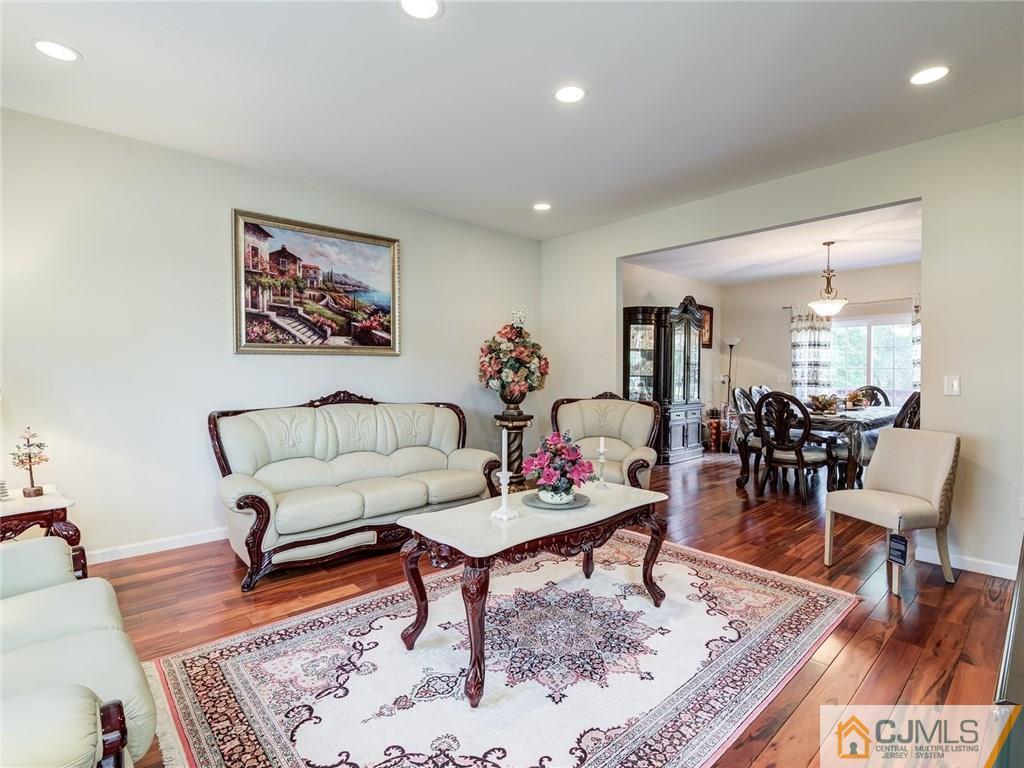 110 Cottrell Road Old Bridge, NJ 07747 - Photo 5 of 25 a living room with furniture and wooden floor
