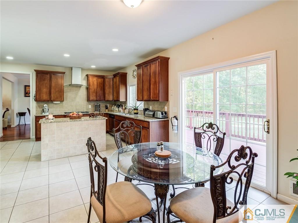 110 Cottrell Road Old Bridge, NJ 07747 - Photo 9 of 25 a view of a dining room with furniture window and outside view