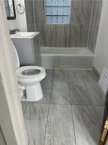 a kitchen with a sink and a stove