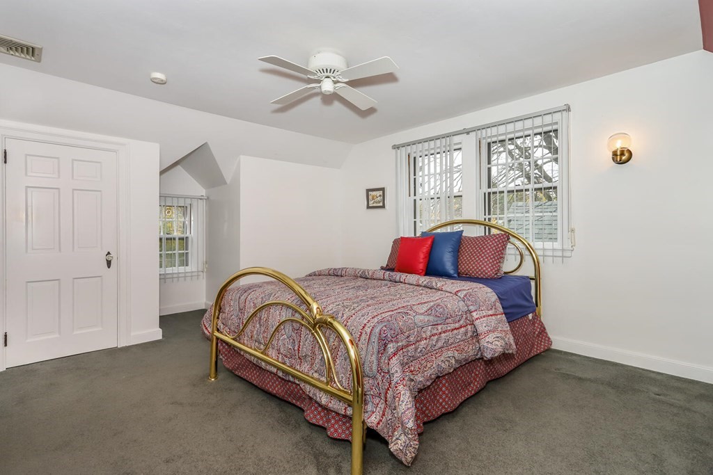 160 High Street Canton, MA 02021 - Photo 16 of 22 a bedroom with a bed and window