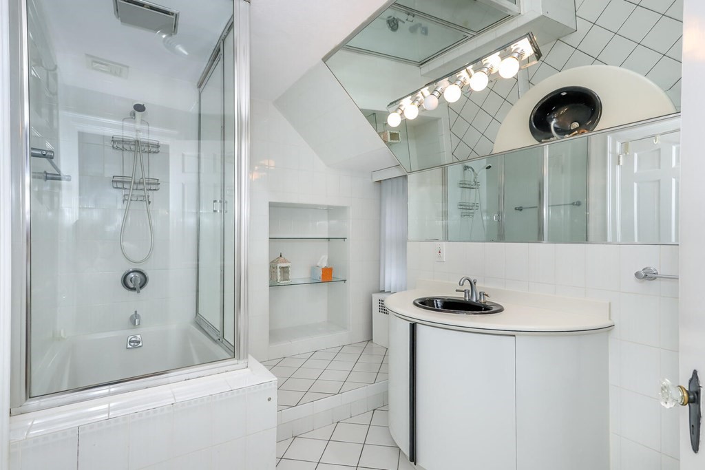 160 High Street Canton, MA 02021 - Photo 18 of 22 a bathroom with a sink a toilet and shower