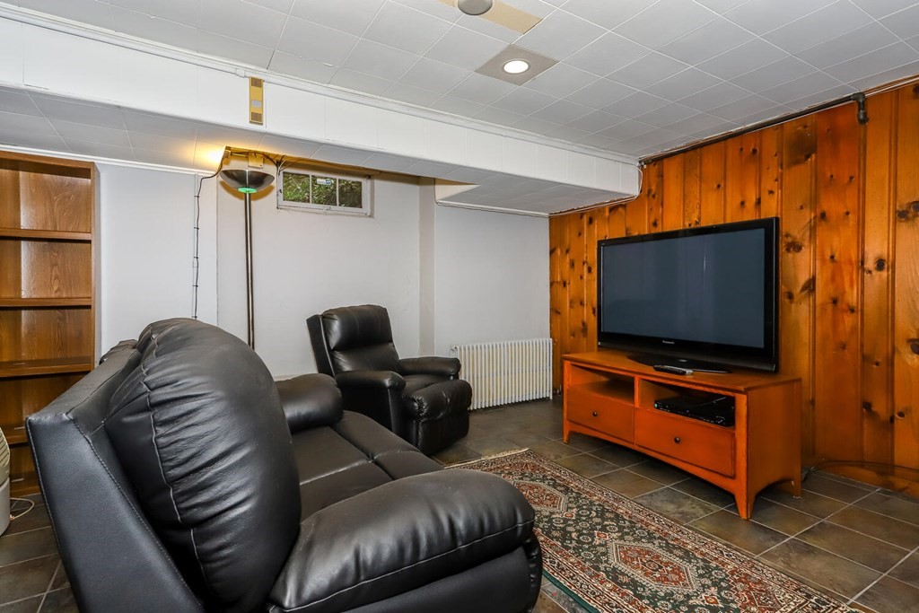 160 High Street Canton, MA 02021 - Photo 19 of 22 a living room with furniture and a flat screen tv