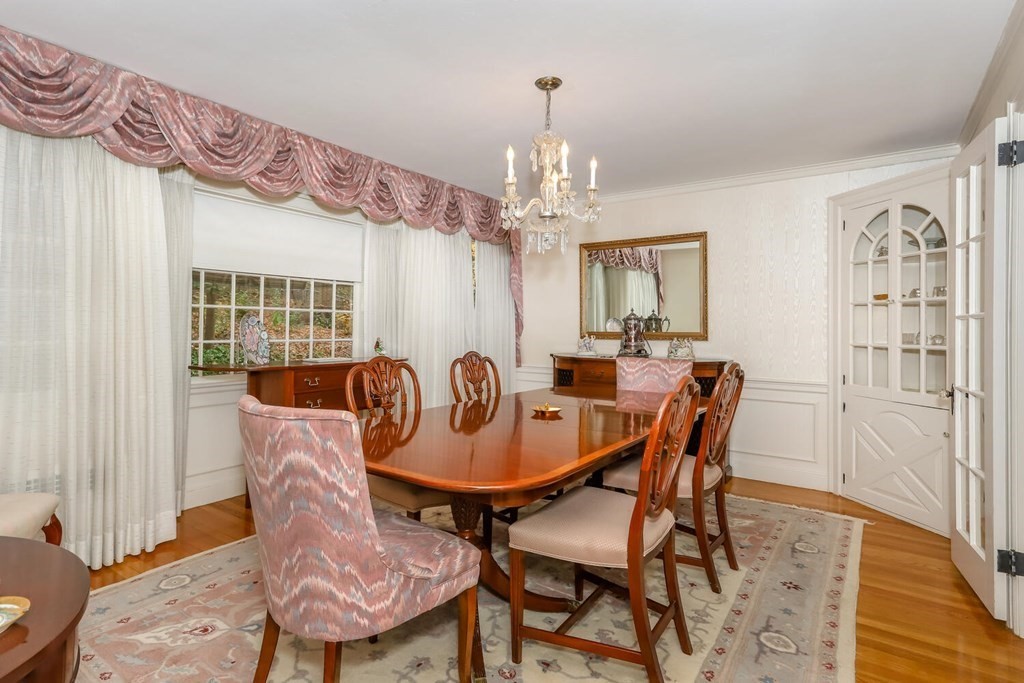160 High Street Canton, MA 02021 - Photo 8 of 22 a dining room with furniture a chandelier and wooden floor