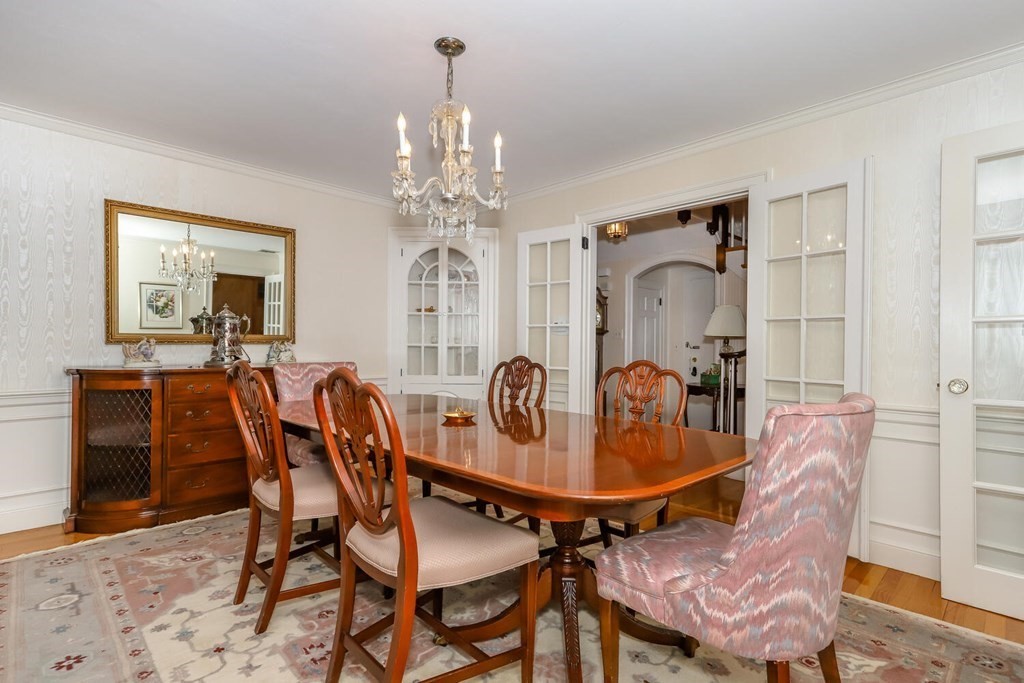160 High Street Canton, MA 02021 - Photo 9 of 22 a dining room with furniture a chandelier and wooden floor