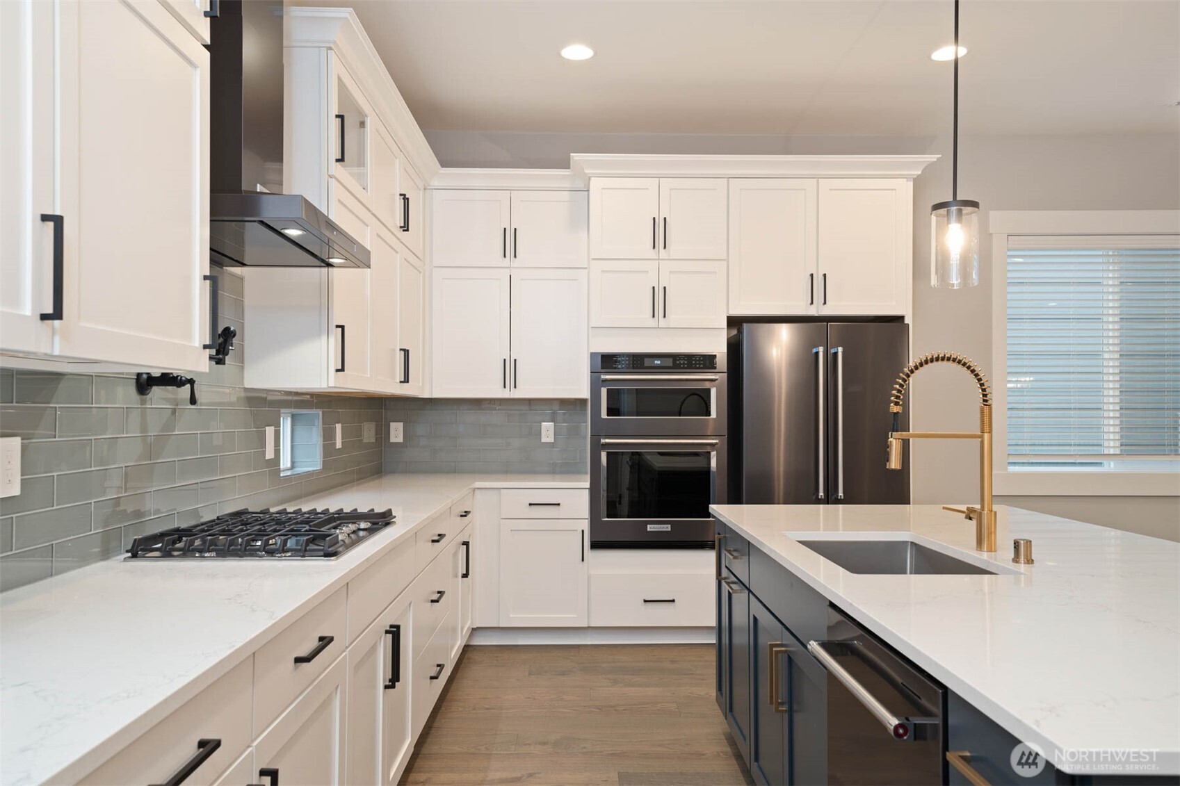 7560 South 130th Place Seattle, WA 98178 - Photo 26 of 27 a kitchen with a sink stove and refrigerator
