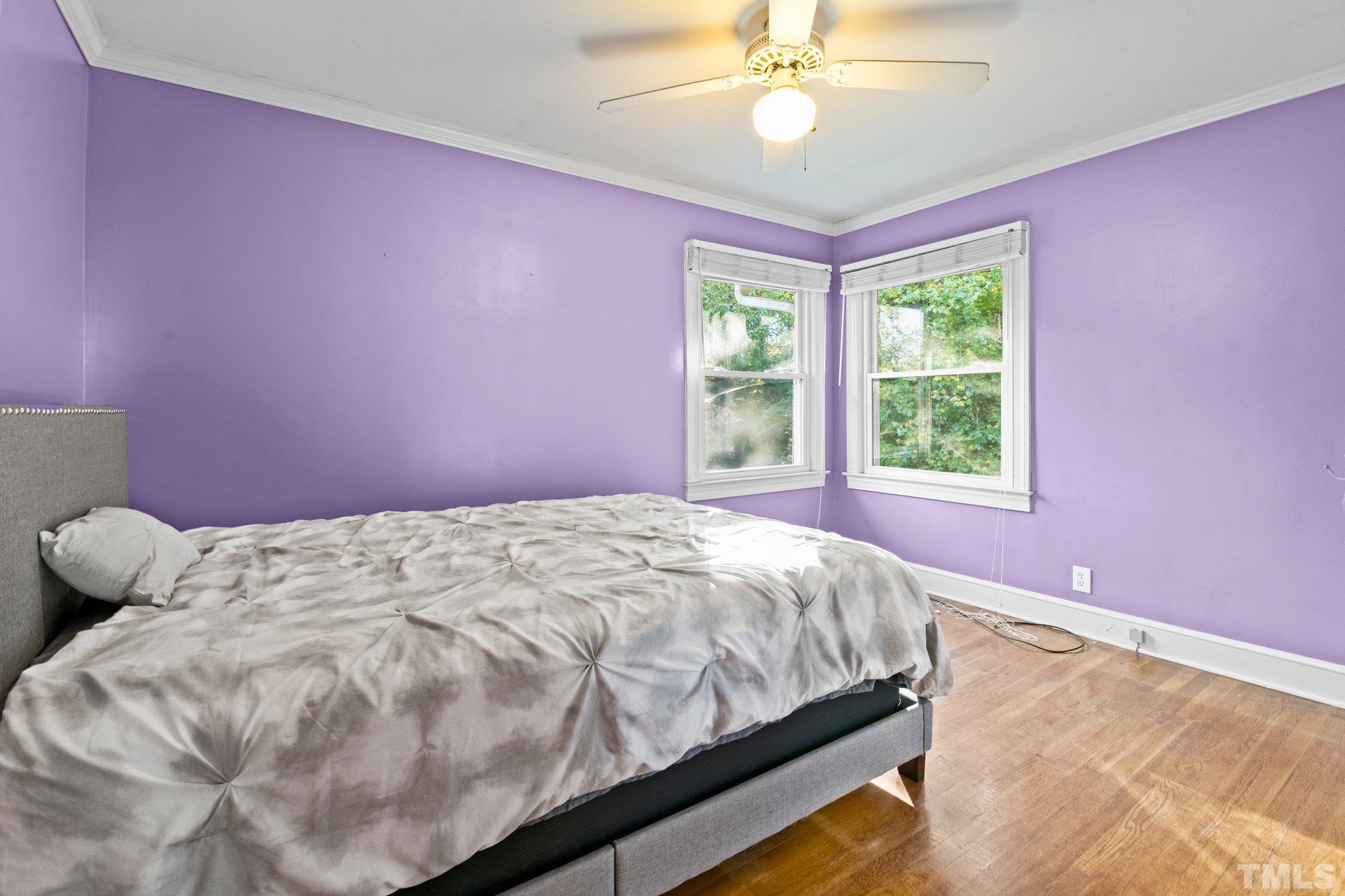 450 Younger Road Roxboro, NC 27573 - Photo 30 of 43 a bed sitting in a bedroom next to a window