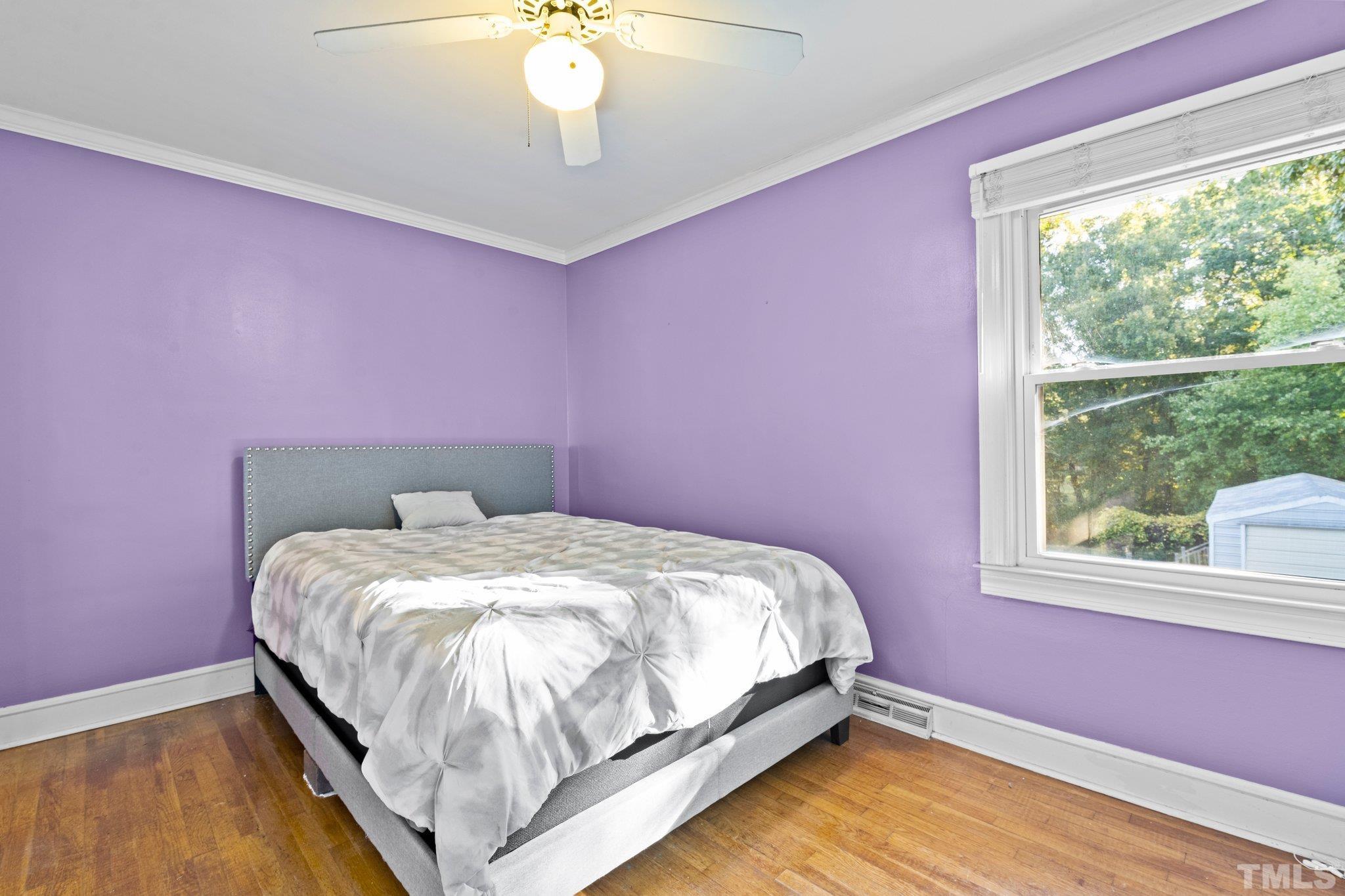 450 Younger Road Roxboro, NC 27573 - Photo 31 of 43 a bed room with a bed and a window