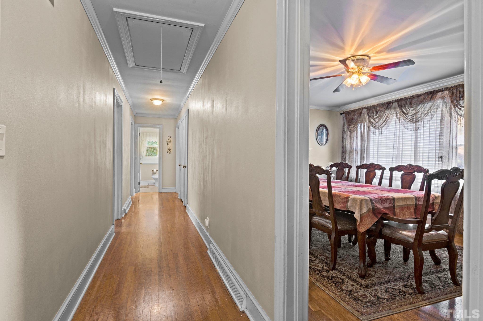 450 Younger Road Roxboro, NC 27573 - Photo 38 of 43 a view of a dining room with furniture and wooden floor