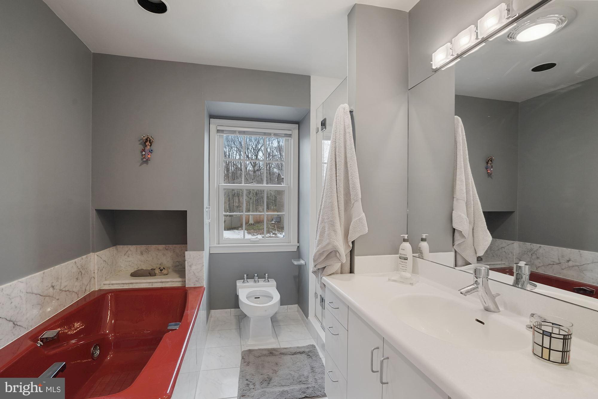 4062 Ridgeview Circle McLean, VA 22101 - Photo 45 of 56 Updated Primary Bath with luxury tub and bidet