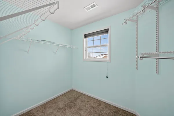 a view of a room with rack on the wall