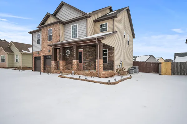 a view of a house with a patio