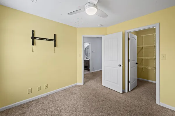 a view of a room with a hallway