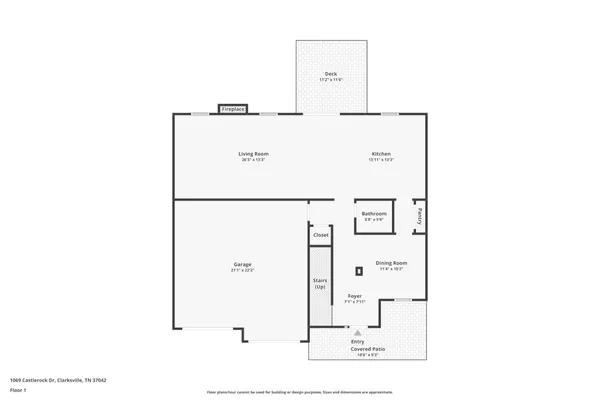 a picture of a room with a cabinet and refrigerator