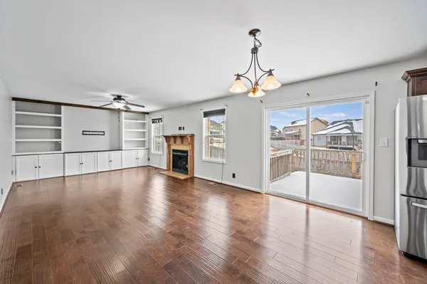 a view of a livingroom with wooden floor