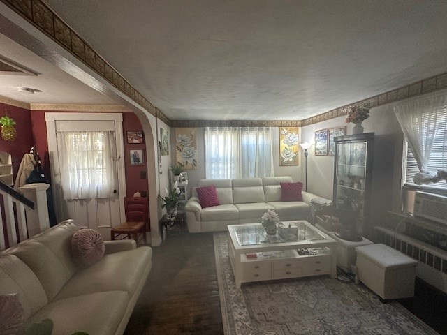 24 Litchfield Street Worcester, MA 01603 - Photo 3 of 14 a living room with furniture and a large mirror