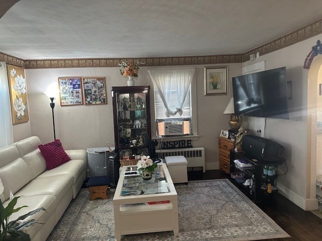 24 Litchfield Street Worcester, MA 01603 - Photo 5 of 14 a living room with furniture and a flat screen tv