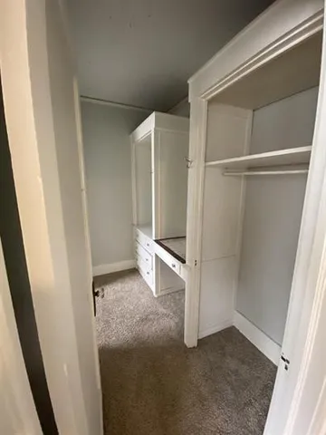 a bathroom with a toilet and a bathtub