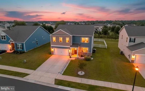 an aerial view of a house with swimming pool