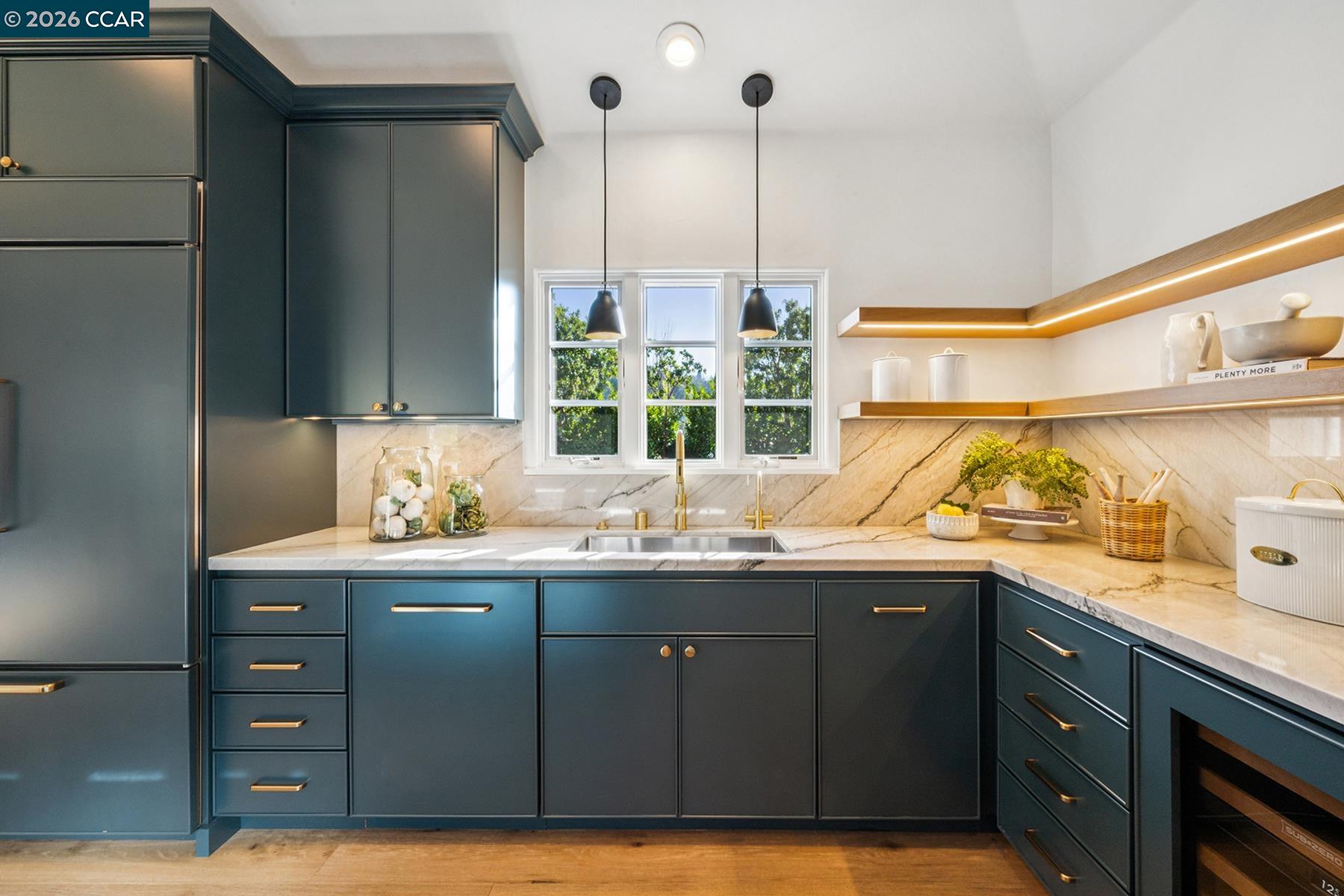 910 Carl Road Lafayette, CA 94549 - Photo 15 of 48 a kitchen with a sink and cabinets
