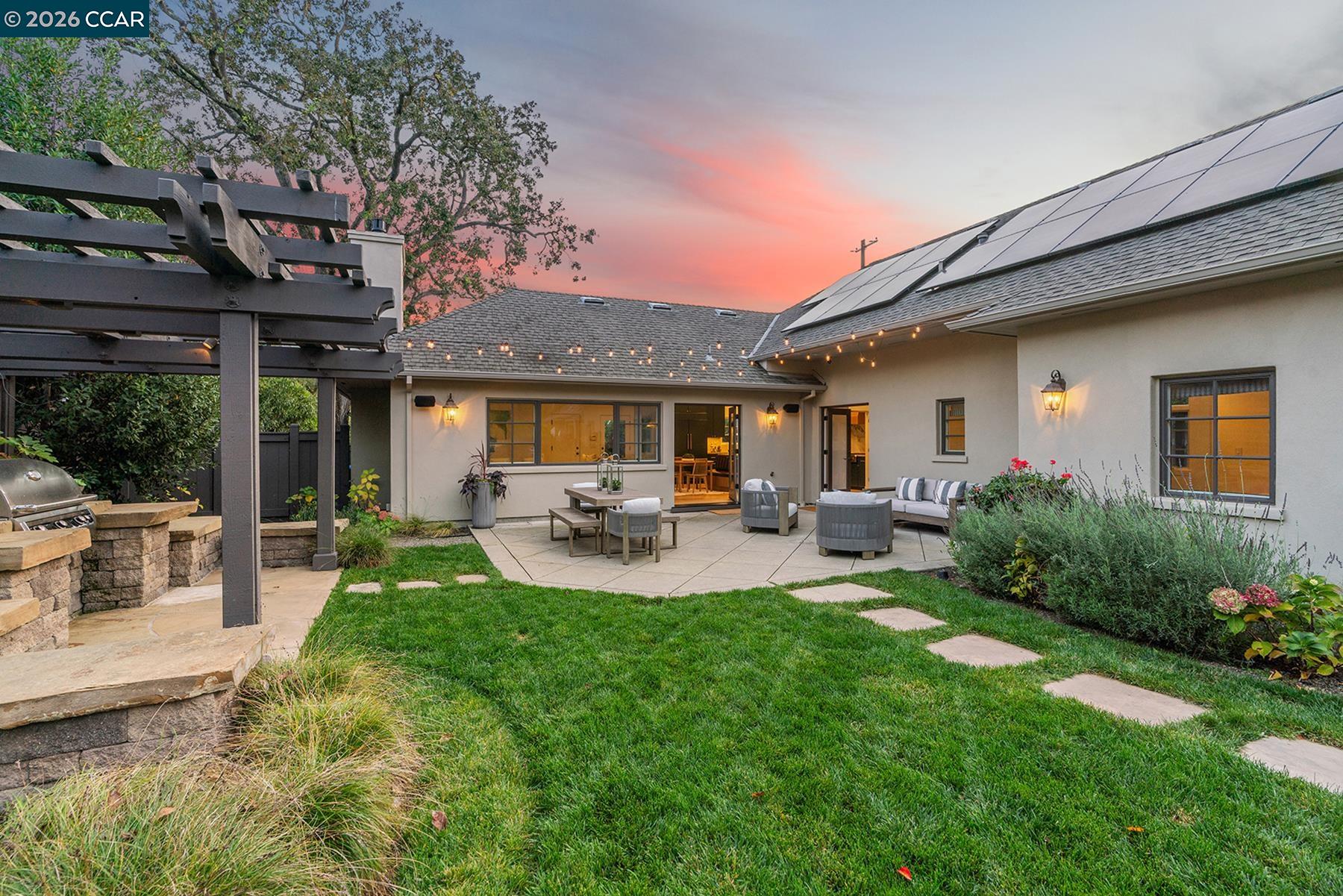 910 Carl Road Lafayette, CA 94549 - Photo 20 of 48 a front view of a house with patio and garden