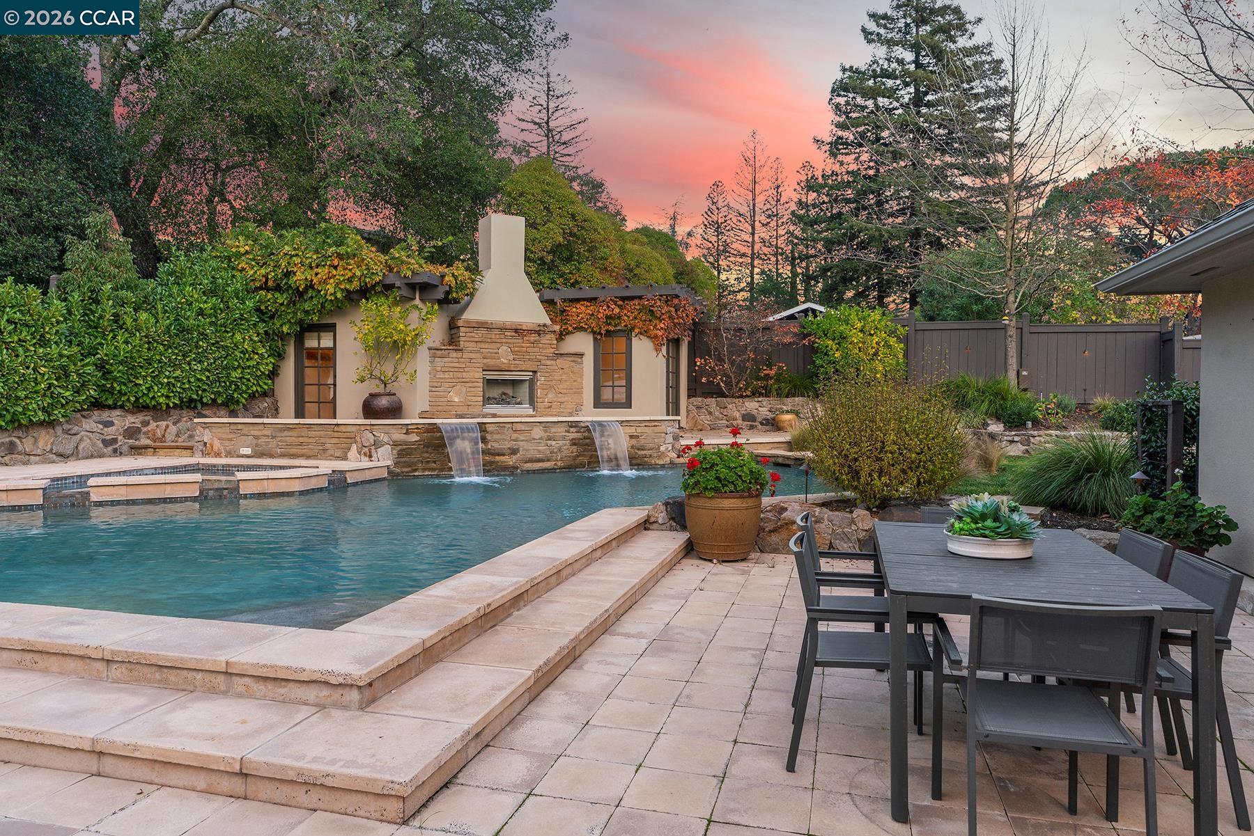 910 Carl Road Lafayette, CA 94549 - Photo 27 of 48 a view of a house with backyard and sitting area