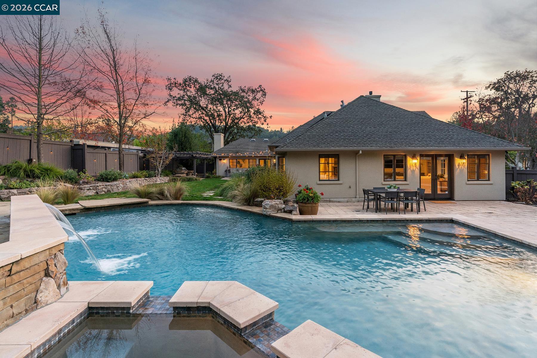 910 Carl Road Lafayette, CA 94549 - Photo 28 of 48 a view of a house with swimming pool and sitting area
