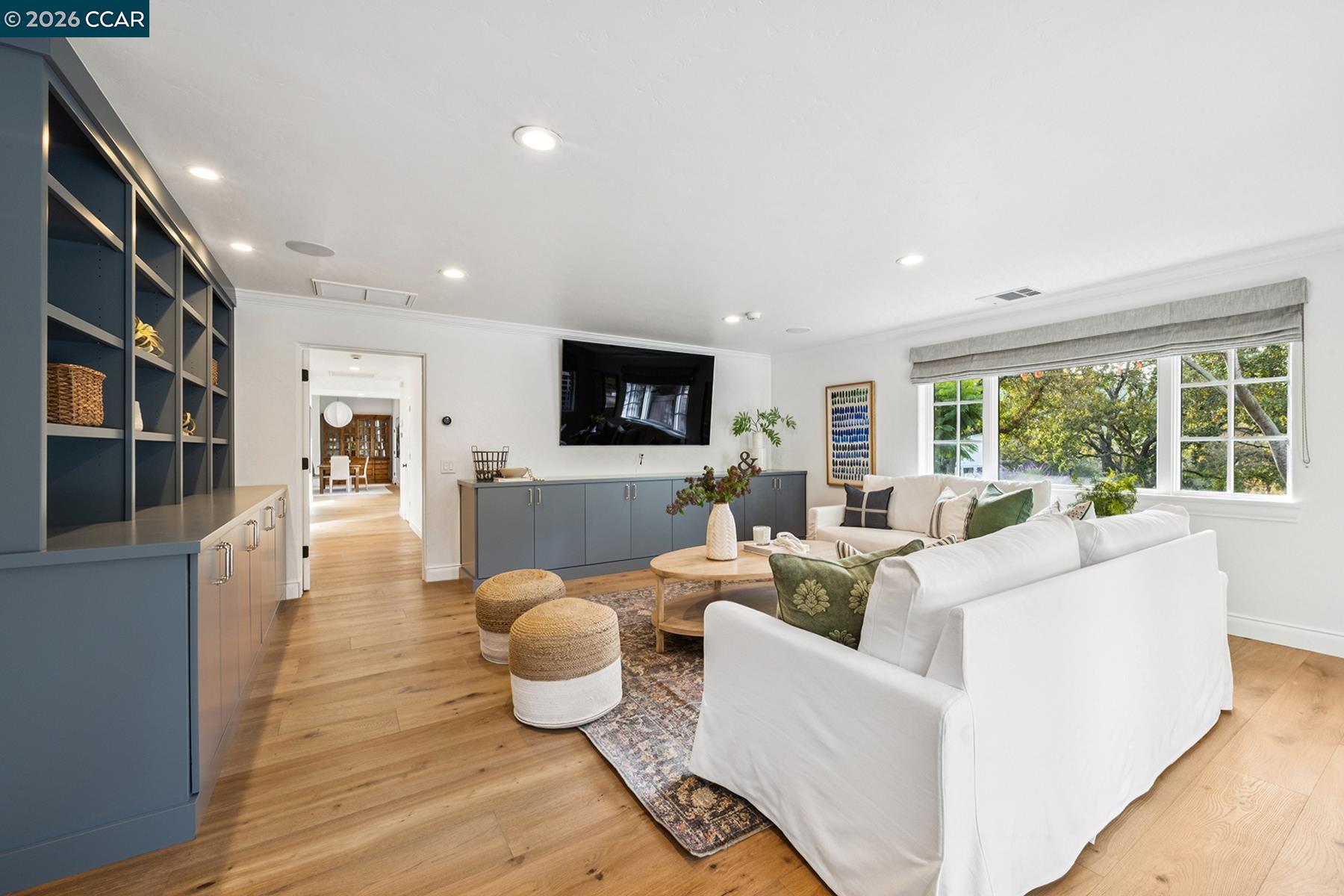 910 Carl Road Lafayette, CA 94549 - Photo 30 of 48 a living room with furniture and a flat screen tv