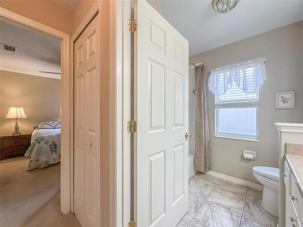 5300 Treasure View Way Leesburg, FL 34748 - Photo 20 of 47 a en suite bathroom with a toilet