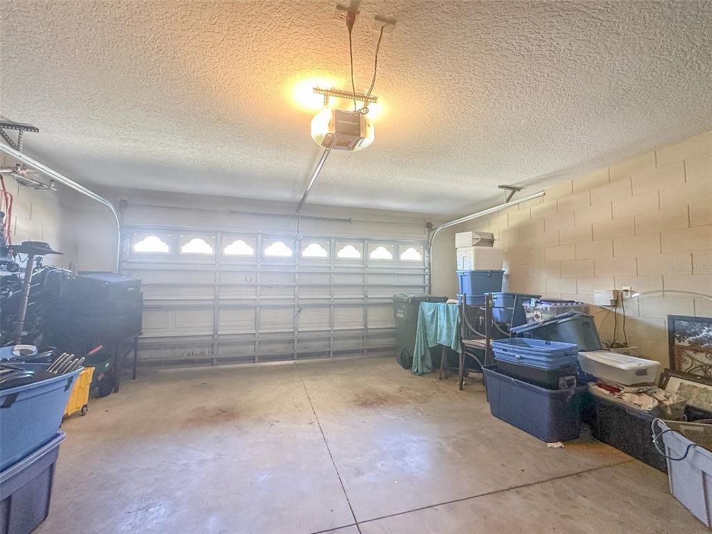 5300 Treasure View Way Leesburg, FL 34748 - Photo 25 of 47 a outdoor space with lots of wooden furniture