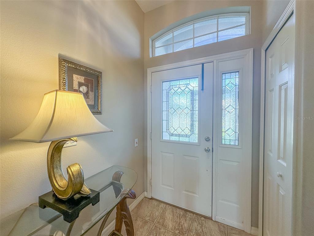 5300 Treasure View Way Leesburg, FL 34748 - Photo 3 of 47 a view of entryway with wooden floor