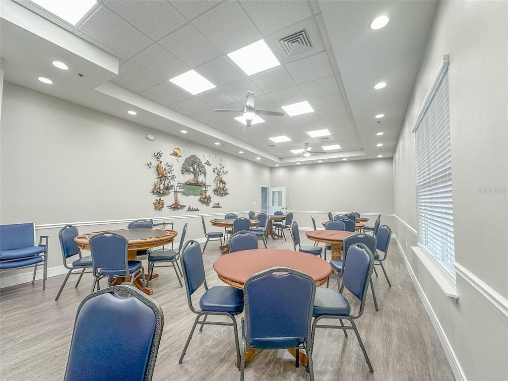 5300 Treasure View Way Leesburg, FL 34748 - Photo 35 of 47 a view of a dining room with furniture