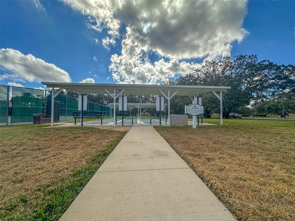 5300 Treasure View Way Leesburg, FL 34748 - Photo 37 of 47 front view of a house with a yard