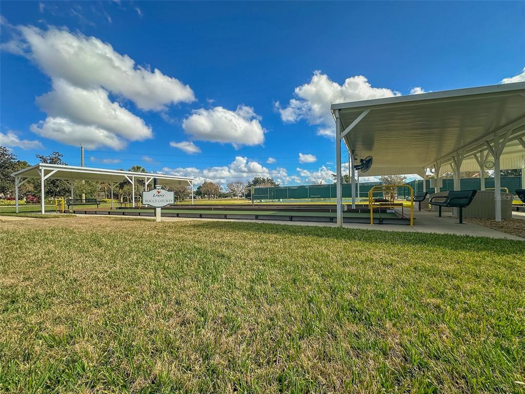 5300 Treasure View Way Leesburg, FL 34748 - Photo 40 of 47 a view of a house with a big yard