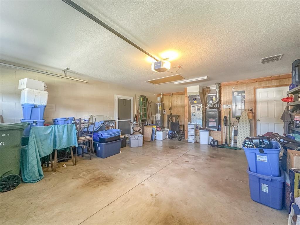 5300 Treasure View Way Leesburg, FL 34748 - Photo 44 of 47 a living room with furniture and a large window