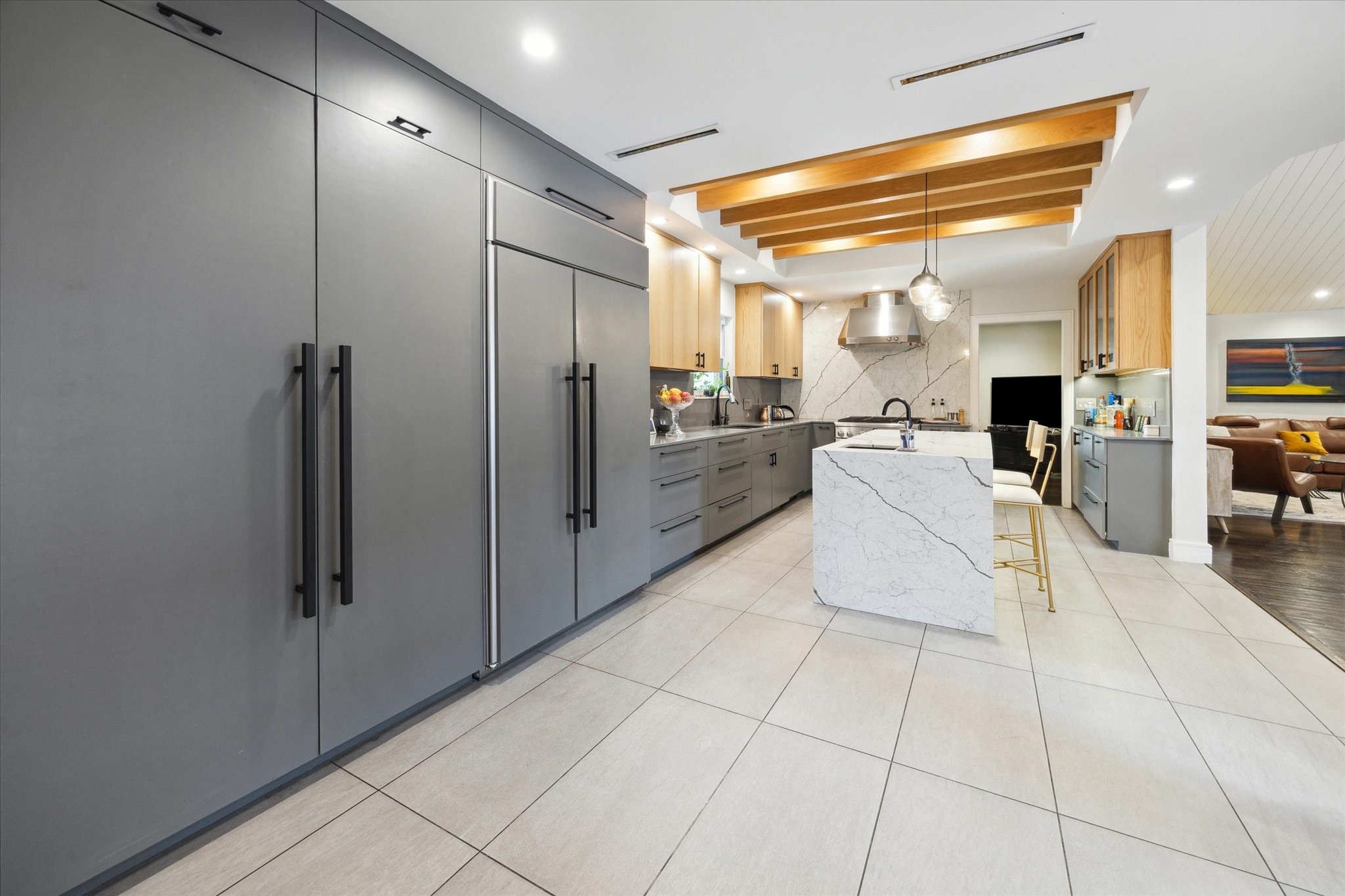1902 Chimney Rock Road Houston, TX 77057 - Photo 15 of 32 Yes, those are very large refrigerators and freezers! Such a spacious room to hang out and watch the chef prepare dinner while you sit and sip your favorite drinks!