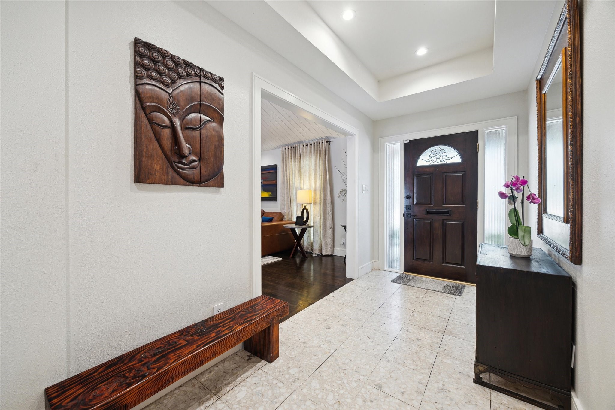 1902 Chimney Rock Road Houston, TX 77057 - Photo 6 of 32 Welcome to the wide and spacious entry with lovely large format floors. Please note the coved ceiling with recessed lighting and lovely front door.