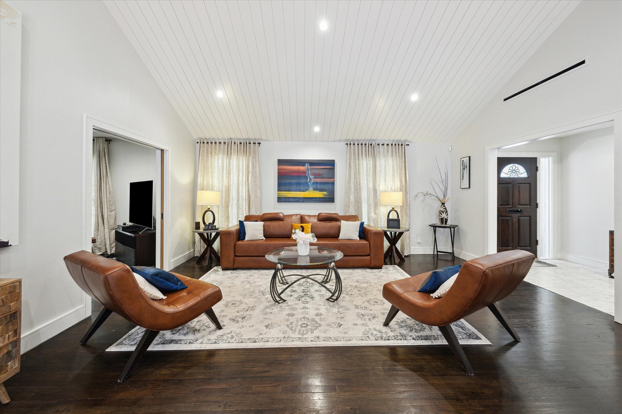 1902 Chimney Rock Road Houston, TX 77057 - Photo 7 of 32 What a spacious living area! Notice the recently added coved ceiling and lovely hardwood floors!