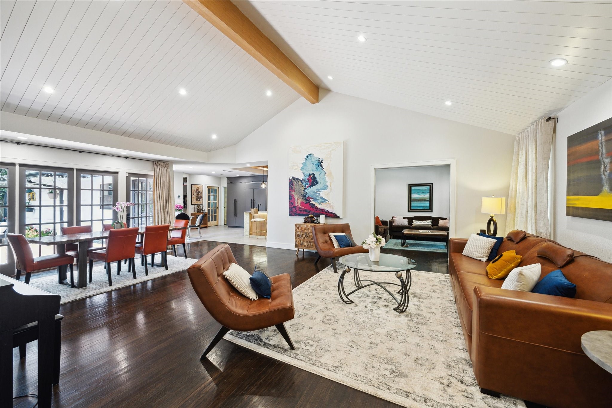 1902 Chimney Rock Road Houston, TX 77057 - Photo 8 of 32 From the formal living area with raised ceiling you'll find the formal dining room with floor to ceiling paned glass windows and doors with a view to the lovely back yard!