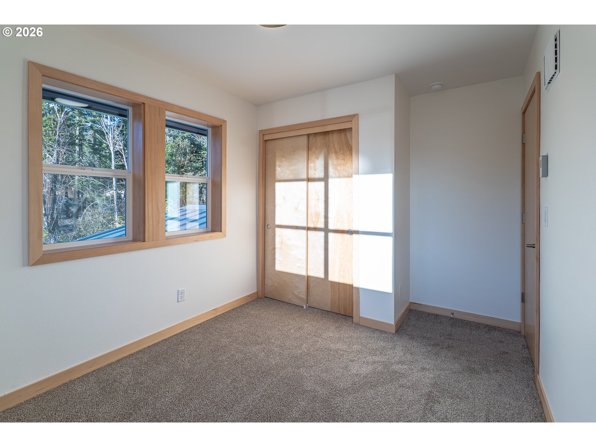 51702 Rose Street Blue River, OR 97413 - Photo 13 of 17 a view of an empty room with a window