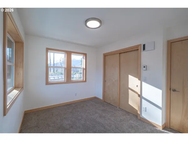 a view of a livingroom with a window