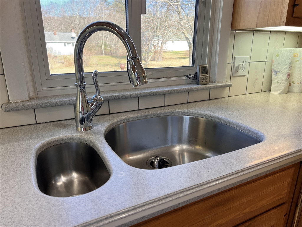 31 Upper Gore Road Webster, MA 01570 - Photo 12 of 33 a close view of sink and tap