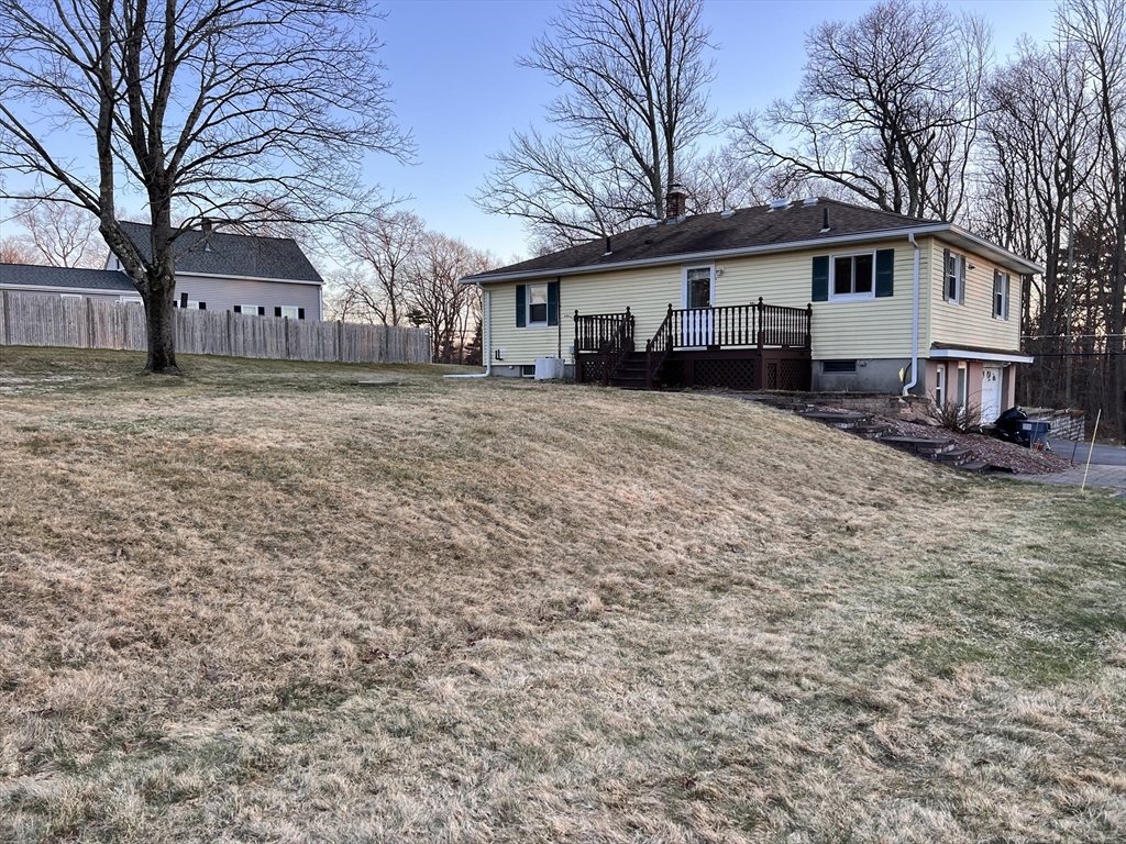 31 Upper Gore Road Webster, MA 01570 - Photo 31 of 33 a front view of a house with a yard and trees